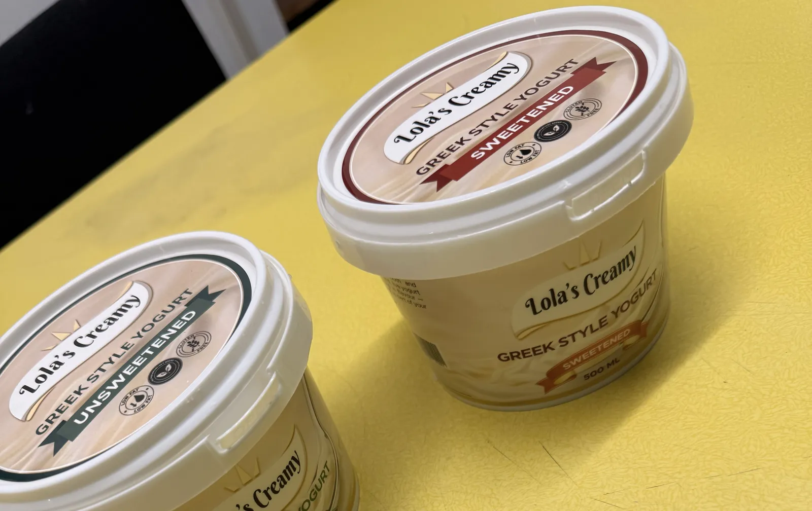 Sweetened and unsweetened Lola's Creamy tubs together