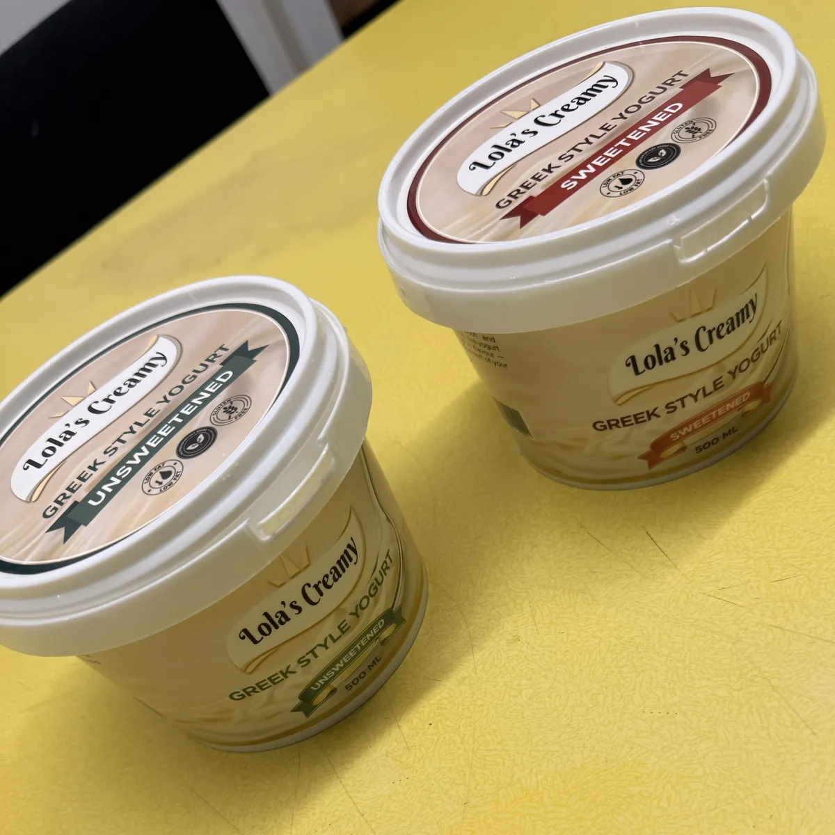 Sweetened and unsweetened Lola's Creamy tubs side by side